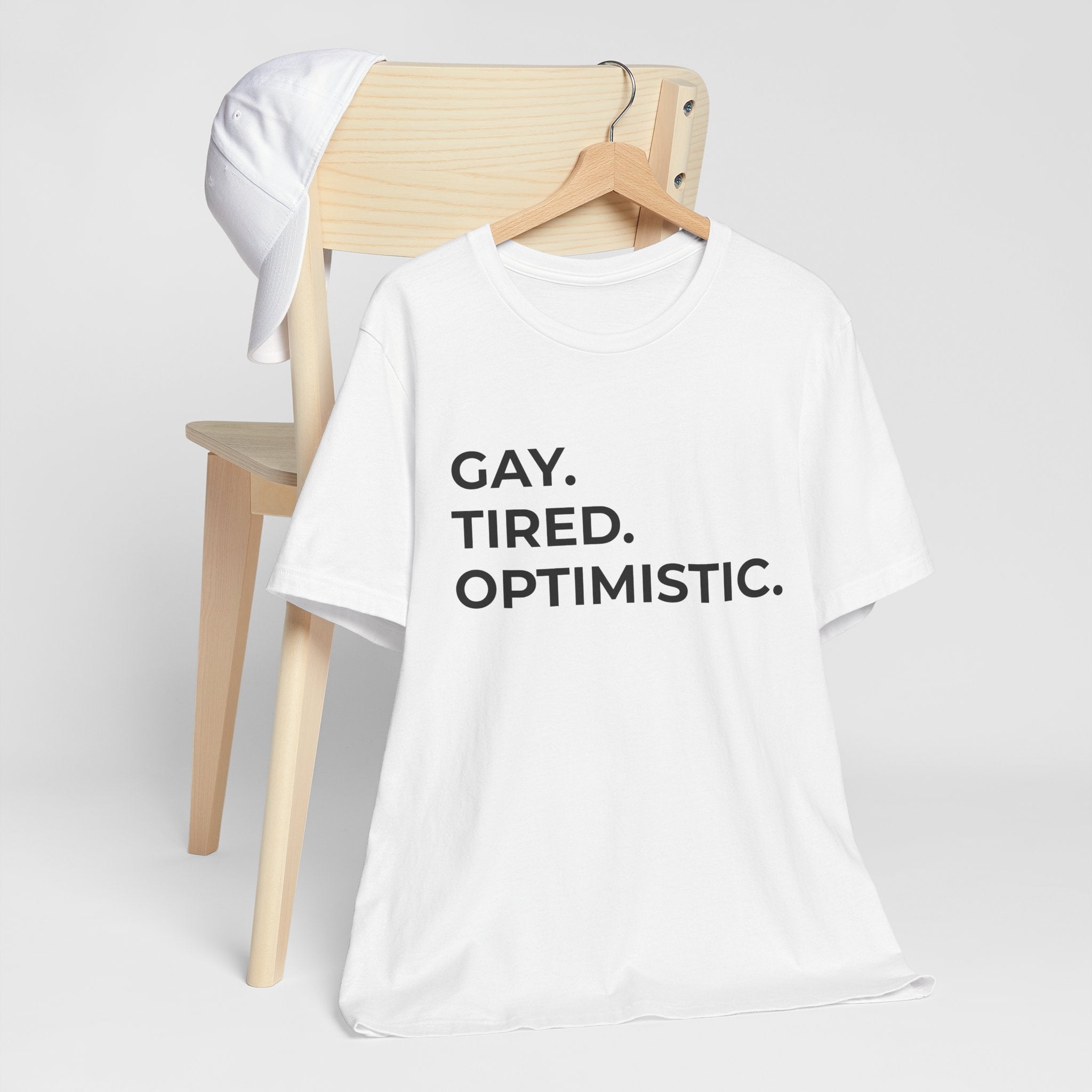 GAY. TIRED. OPTIMISTIC.